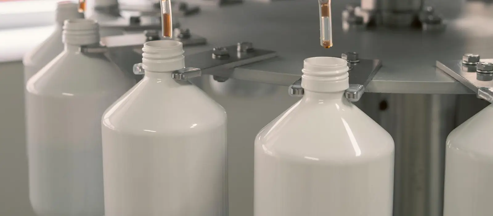 Bottles being filled on the line in Uffelte