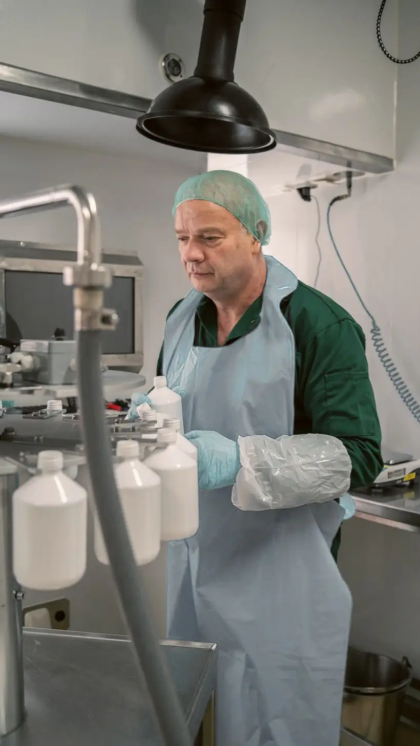 One of the team at the filling line in Uffelte